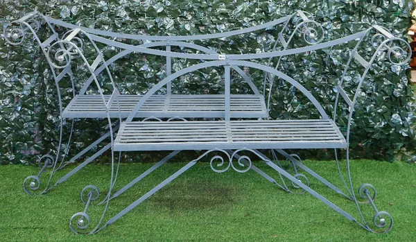 A pair of Regency style grey painted strap iron garden benches, 166cm wide x 94cm high.