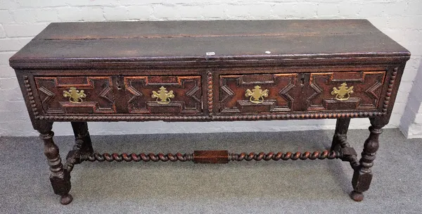 A Charles II oak dresser base with a pair of geometric moulded frieze drawers on baluster turned supports united by a barley-twist stretcher, 152cm wi