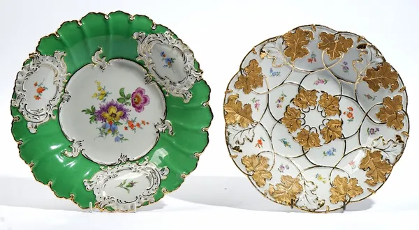 Two Meissen dishes, 20th century, the first outside-decorated with flowers against an apple green-ground, cancelled crossed swords mark, 30cm. diamete