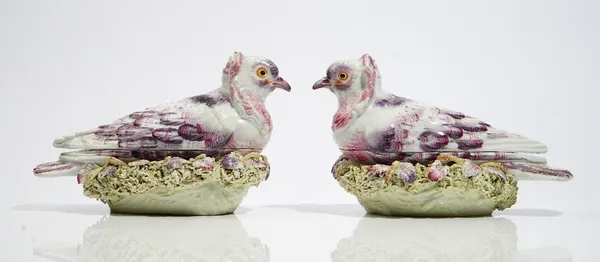 A pair of Derby pigeon tureens and covers, circa 1760, each bird seated on a nest encrusted with twigs and feathers, 20.5cm. length, (4).