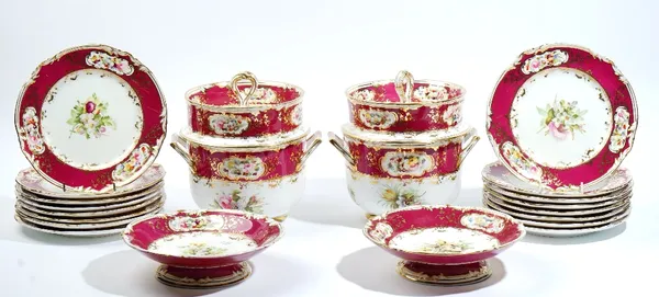 A Coalport porcelain part dessert service, circa 1840, each piece well painted with flower groups against a claret ground, comprising; a pair of two-h