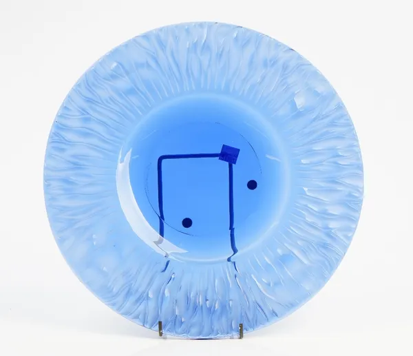 A large Lalique blue glass plate, late 20th century, the border moulded and frosted with a seaweed type design, engraved Lalique France and R within i