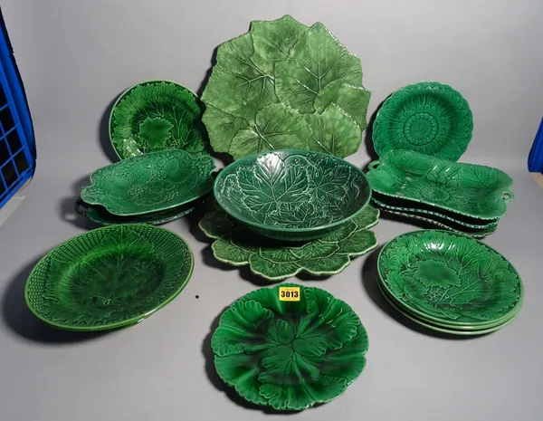 Wedgwood Etruria, a quantity of green majolica decorated plates and further similar decorated plates, (qty).