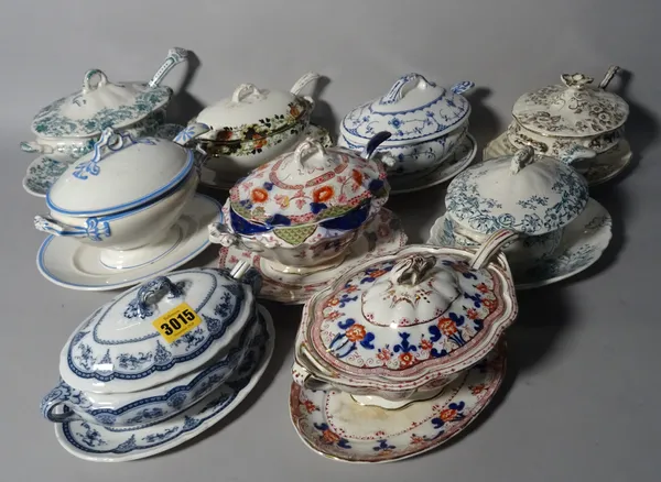 A group of nine ceramic tureen and covers, including Booths, (9).