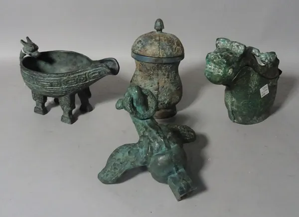 Three Chinese archaic style bronze vessels, a bird finial and a two handled vase.