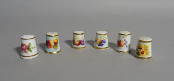 A group of six Royal Worcester thimbles, black printed marks, painted with flowers or fruit, five signed by artists including D.Wild and Lane, tallest