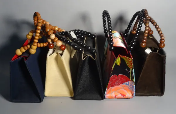 A group of five modern fabric "Pignatelli" handbags of various styles, each 28cm wide x 20cm high, (5).