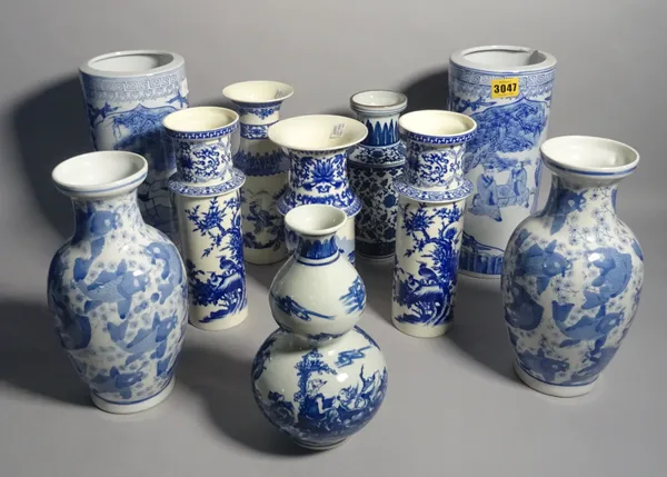 Asian ceramics including; a modern blue and white gourd vase, a pair of vases decorated with Koi carp and five further vases, the largest 29cm high, (