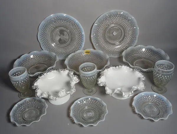 A modern glass part dinner service including plates, bowls and drinking glasses with opaque rim decoration, (qty).