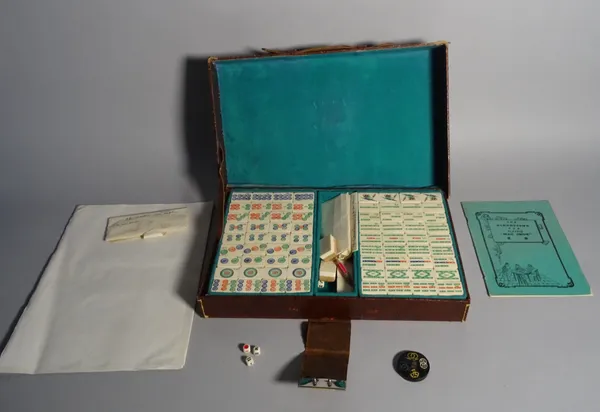 Asian interest, a modern Mahjong set within a leather carrying case, 33cm wide x 5cm high.