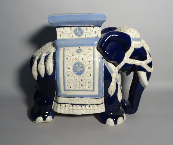 A modern Asian ceramic garden seat formed as an elephant, 55cm wide.