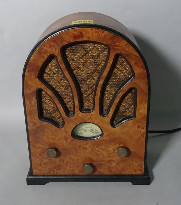 A mid-20th century burr walnut radio, 22cm wide x 28cm high.