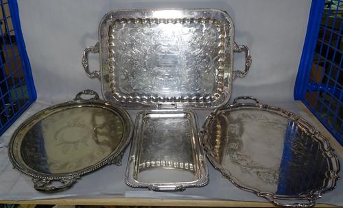 Silver plated wares, comprising seven twin handled serving trays, the largest 62cm wide, (7).