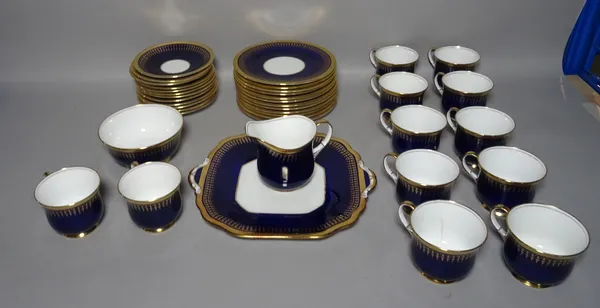 Aynsley; a part tea set with blue ground and gilt rim decoration, (qty).