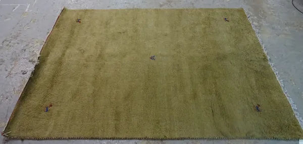 A modern machine made Afghan wool beige carpet, 169cm  x 240cm.