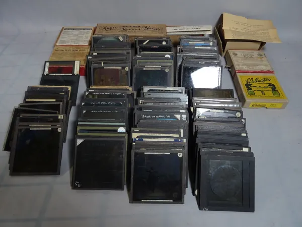 A quantity of magic lantern slides, mostly militaria and religious scenes (qty).