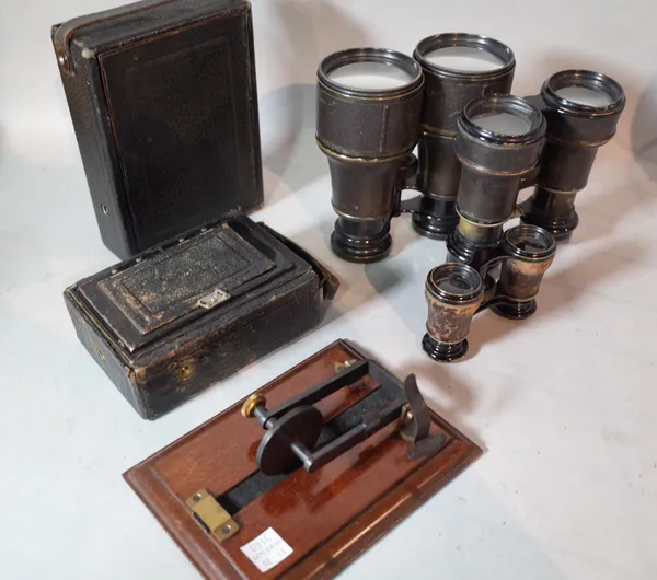 Collectables including a group of three early 20th century binoculars and a quantity of early 20th century photography equipment and sundry.