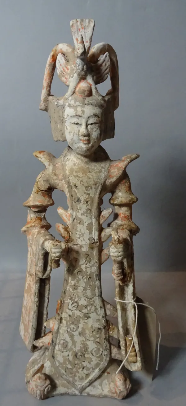 A Chinese pottery figurine of a maiden, probably Tang Dynasty, 37cm high.