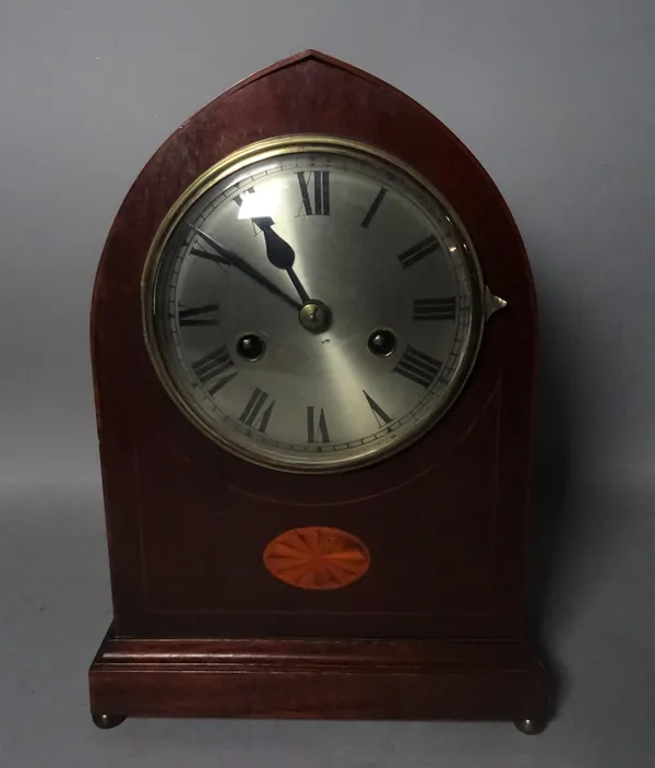 An Edwardian inlaid mahogany lancet clock on bun feet, 22cm wide x 31cm high.