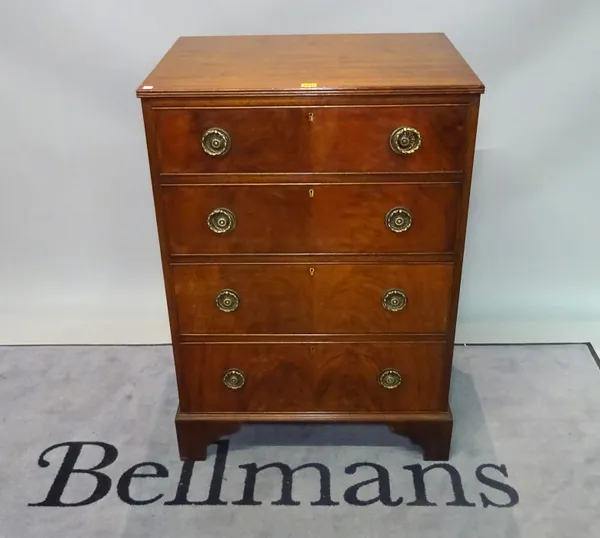 A George III style mahogany chest of four long graduated drawers on bracket feet, 71cm wide x 102cm high.