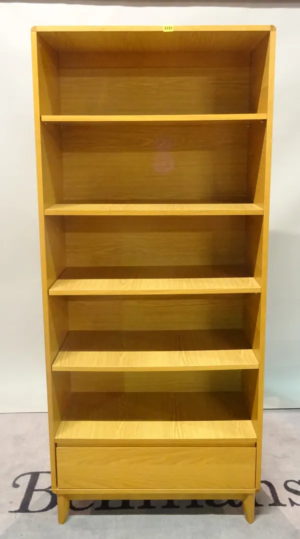 G-Plan, a modern oak bookcase with single drawer base on tapering supports, 80cm wide x 185cm high.