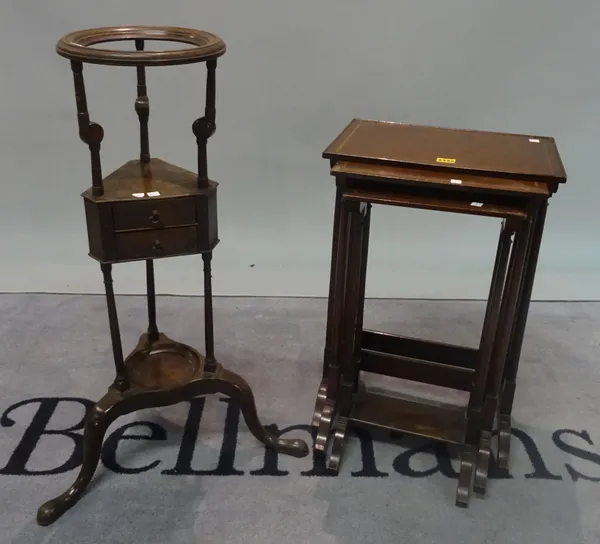 An Edwardian nest of three tulip banded mahogany occasional tables on turned supports, the largest 41cm wide x 61cm high, together with a smaller 18th