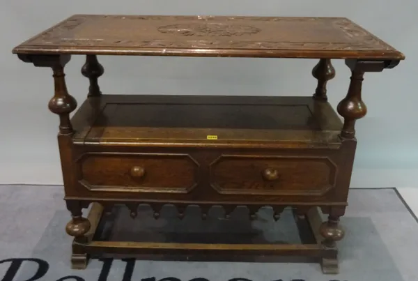 An 18th century style oak monk's bench, 99cm wide x 85cm high.