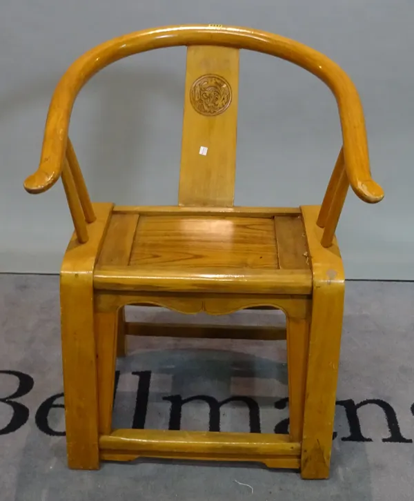 A pair of modern Chinese hardwood horseshoe back open armchairs, 64cm wide x 83cm high.