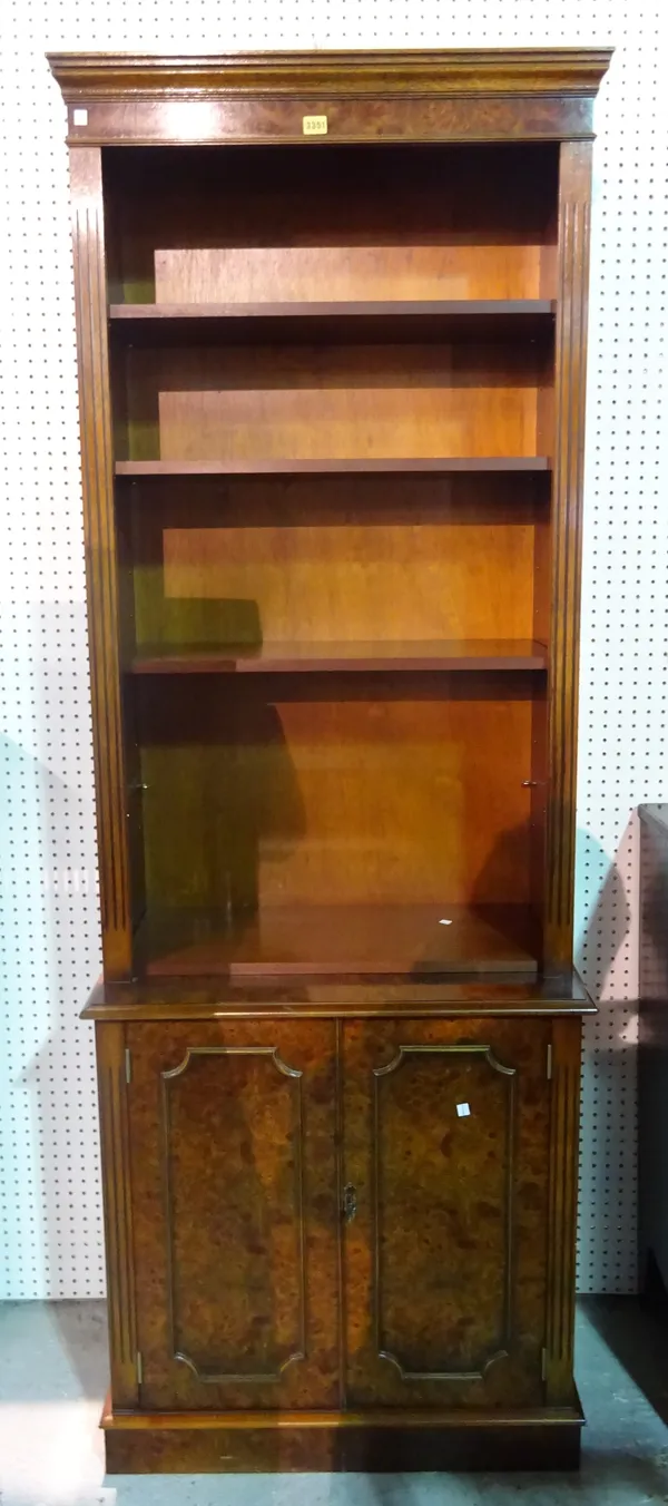 A modern burr walnut bookcase cabinet, 77cm wide x 200cm high.