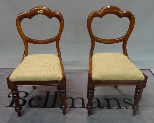 A set of six Victorian mahogany balloon back dining chairs, on turned supports, 46cm wide x 90cm high, (6).