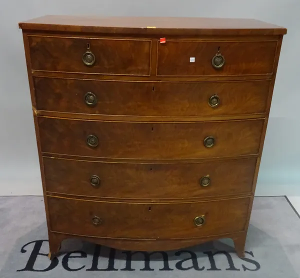 An early 19th century mahogany bowfront chest of five long graduated drawers, on splayed bracket feet, 105cm wide x 119cm high.