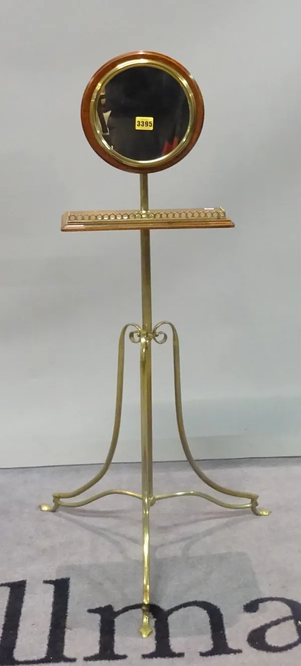 An Edwardian brass and mahogany shaving stand, on three downswept supports, 33cm wide.