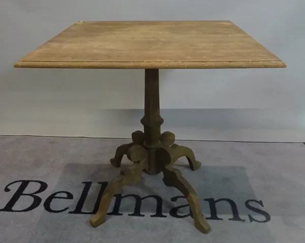 A modern Continental oak tripod table with a square top on turned column over four downswept supports, 80cm wide x 76cm high.