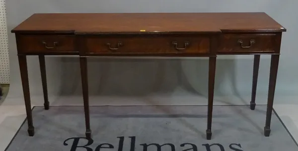 A George III style mahogany breakfront sideboard with three frieze drawers on tapering square supports, 183cm wide x 85cm high.