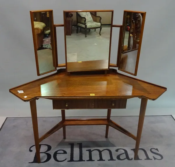 A mid-20th century teak dressing table with single drawer on tapering supports, 118cm wide x 127cm high.