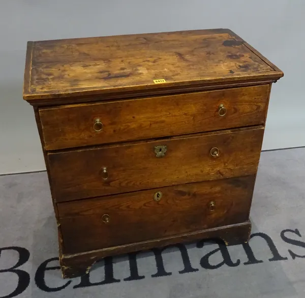 A 19th century elm chest of three long drawers on bracket feet, 72cm wide x 71cm high.