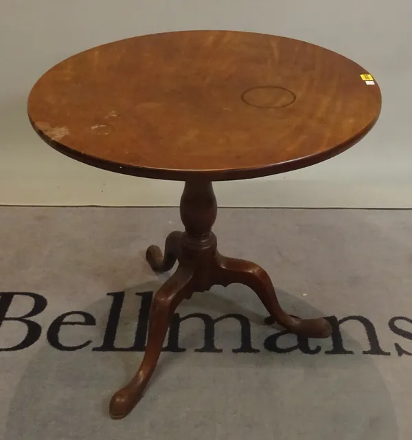 A George III and later mahogany tripod table with turned column on three downswept supports, 75cm dia, x 73cm high.