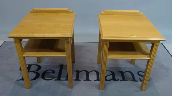 A pair of modern oak two tier bedside tables, 45cm wide x 59cm high.