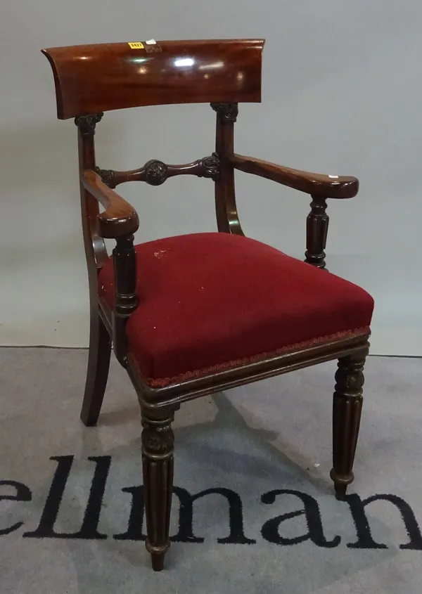 A William IV mahogany framed open armchair on reeded tapering supports, 55cm wide x 98cm high.