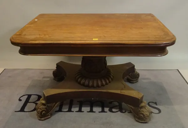 A Regency mahogany console table on acanthus carved legs with quatrefoil base, 114cm wide x 73cm high x 74cm deep.