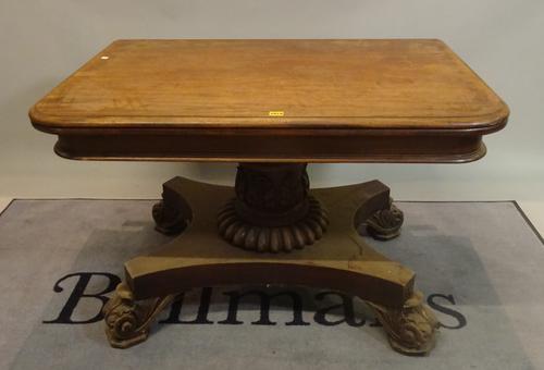 A Regency mahogany console table on acanthus carved legs with quatrefoil base, 114cm wide x 73cm high x 74cm deep.