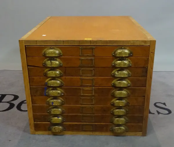 A mid-20th century stained beech collectors chest of nine drawers, 65cm wide x 55cm high.