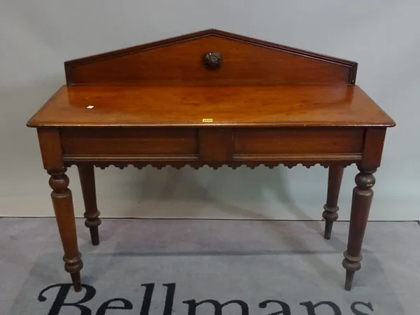 A Victorian mahogany single drawer serving table on turned supports, 119cm wide x 95cm high.