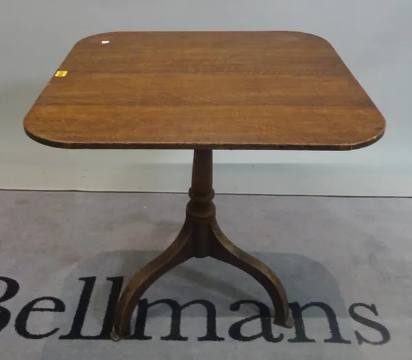 A late 18th century oak tripod table with rectangular top on three downswept supports, 68cm wide x 70cm high.