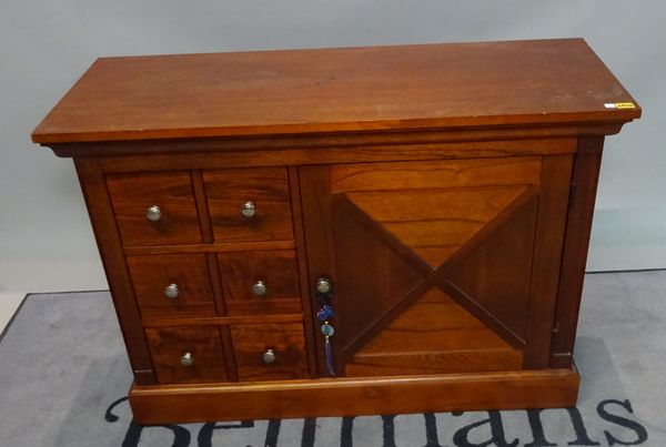 A modern hardwood sideboard with an arrangement of six short drawers and a cupboard, 110cm wide x 76cm high.