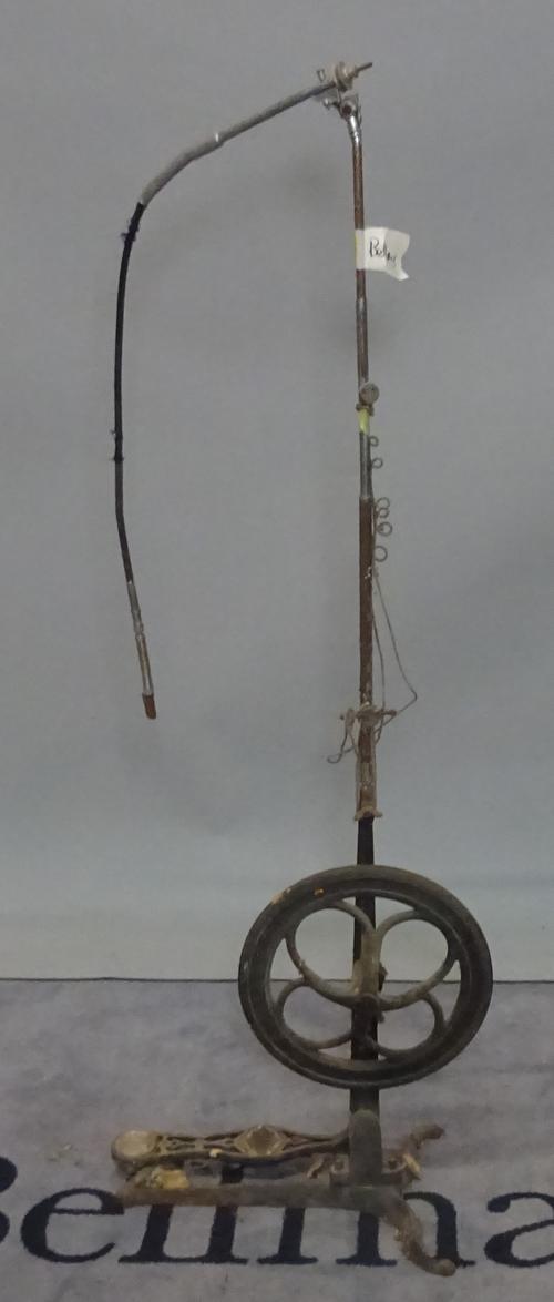 An early 20th century iron and steel treadle powered dentists drill, 137cm high, (a.f).