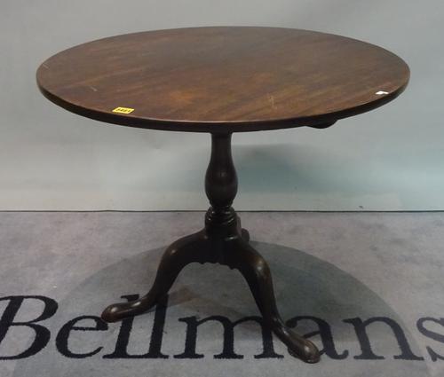 A George III mahogany circular tilt top tripod occasional table, 89cm wide x 70cm high.