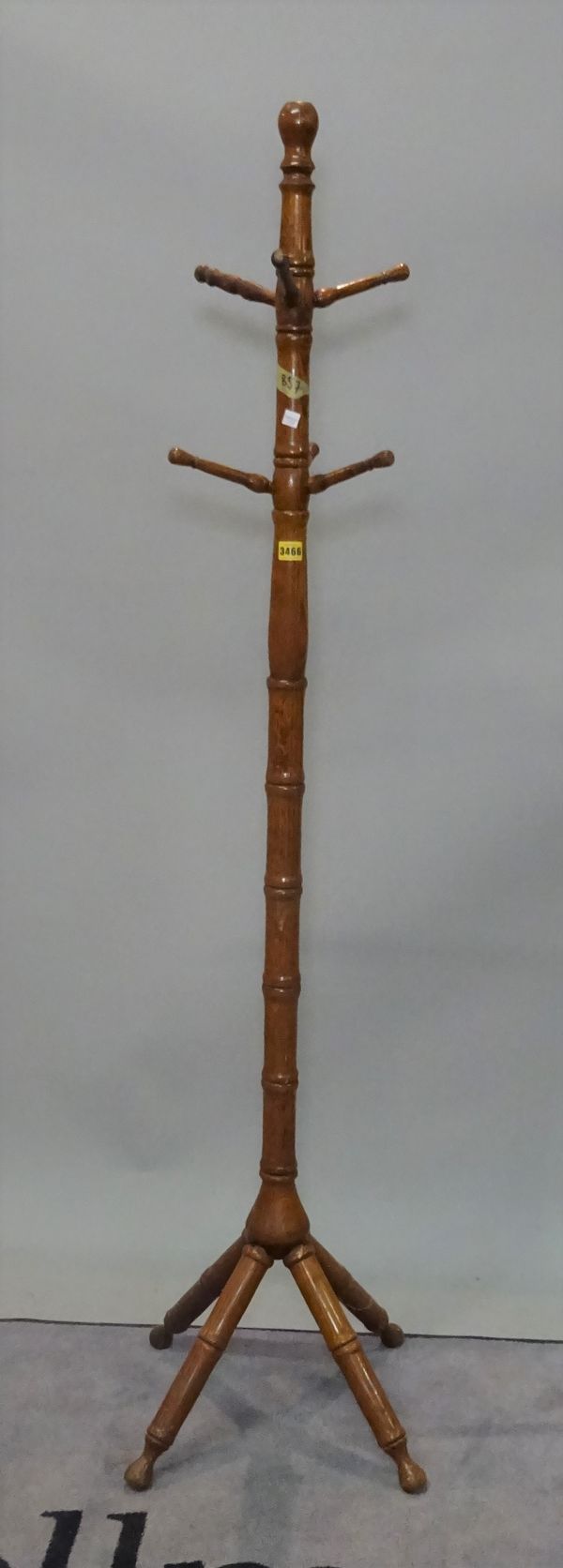 A 20th century turned oak hat and coat stand, 172cm high.