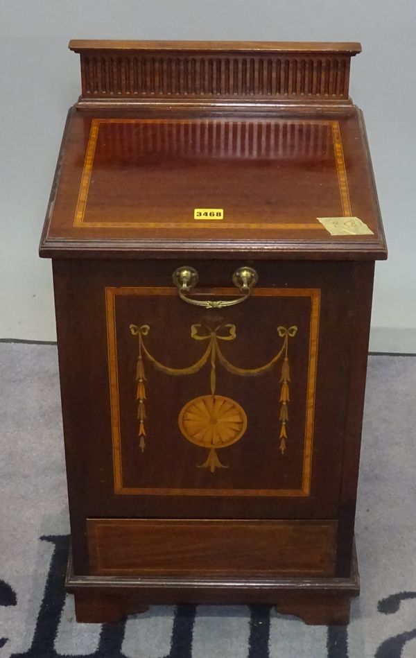 An Edwardian mahogany and inlaid coal purdonium, 38cm wide.