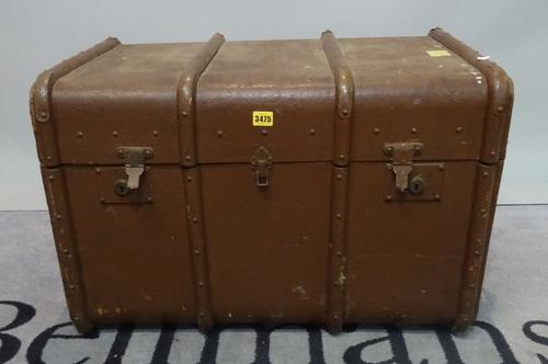 An early 20th century canvas and wood bound travelling trunk, 76cm wide x 52cm high.